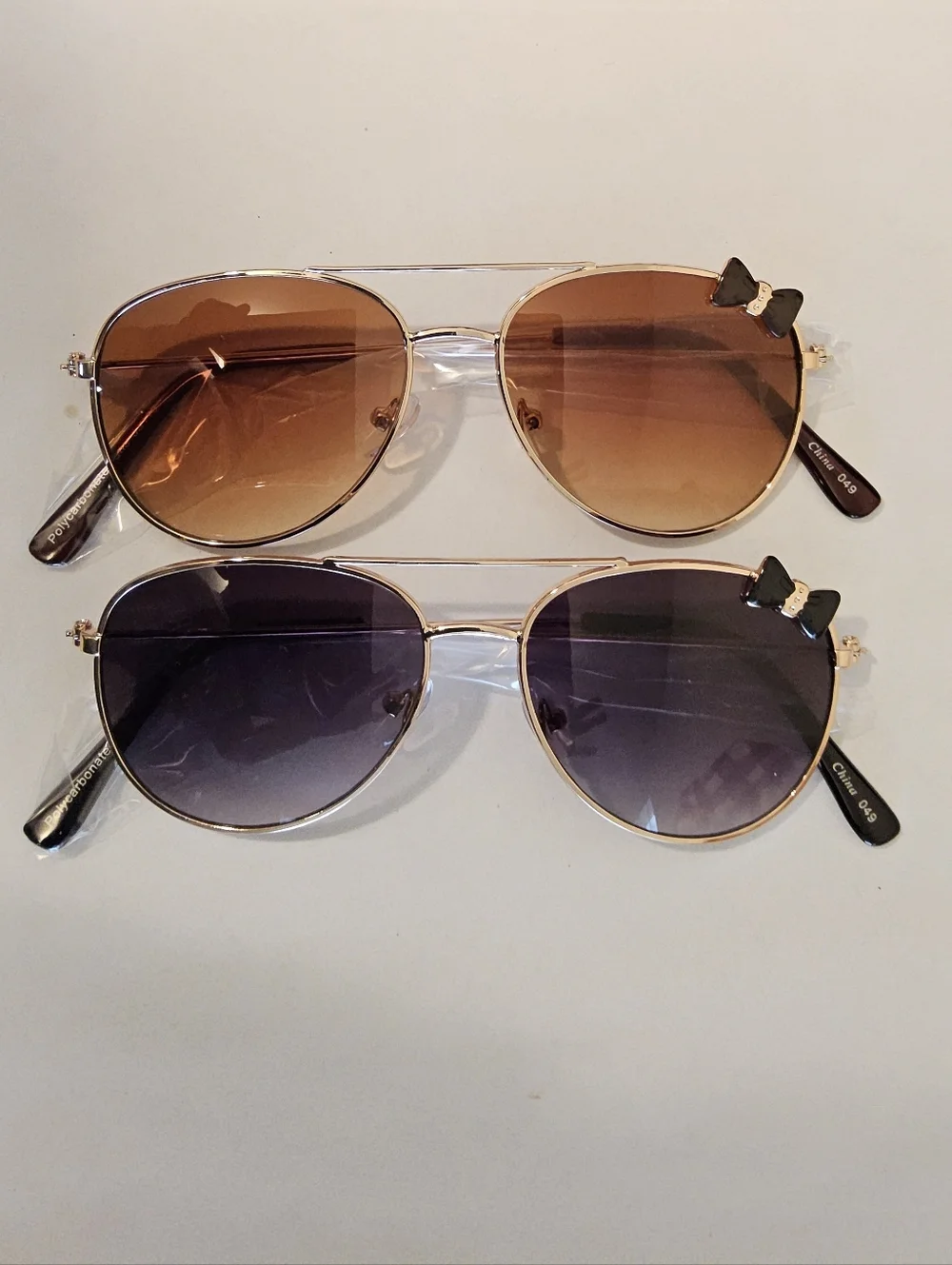 D. Set Of 2 Aviator Style Sunglasses with Bow Accent